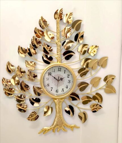 time blossoms on the wall a beautiful golden tree of life clock adding a touch of luxury and natures grace to the space .